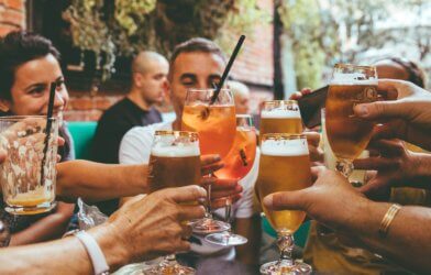 People toasting with alcohol, beer