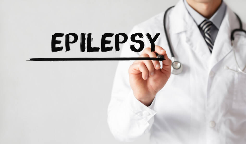 Doctor writing word Epilepsy with marker