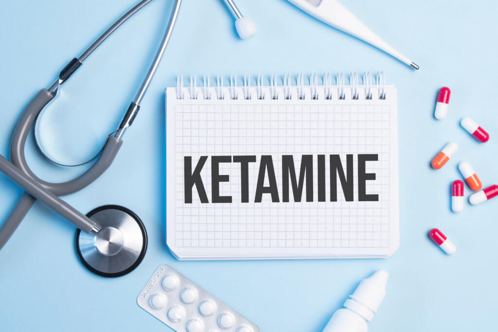 The word ketamine written on a white notepad