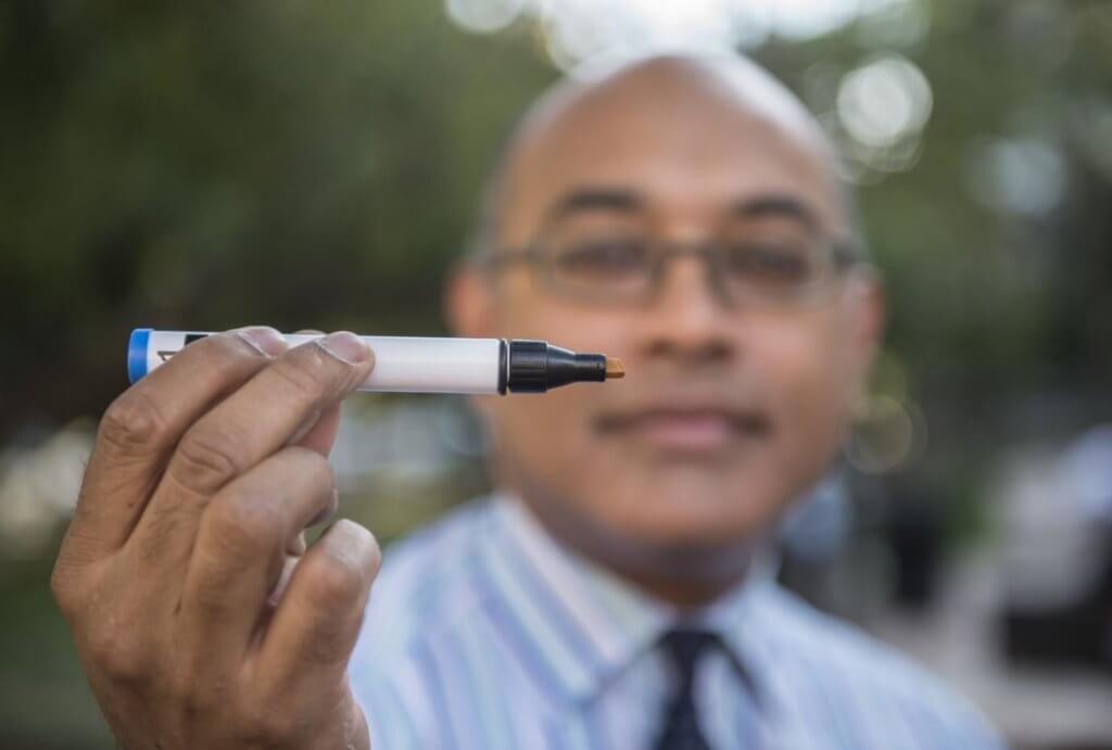 Prof. Jayant Pinto holds smell test