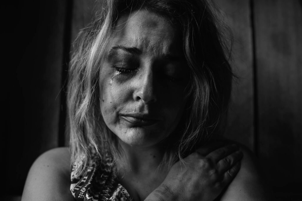 Woman crying, battling depression